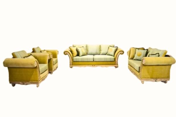 Elegant luxury sofa set with gold accents in a modern living room