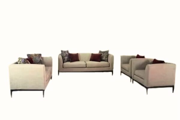 Modern sofa and armchair set with decorative pillows