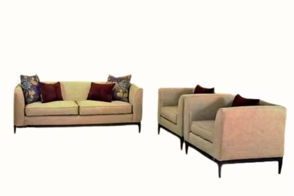 Modern sofa and armchair set with decorative pillows