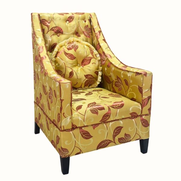 Luxury upholstered accent chair with contrast throw pillow