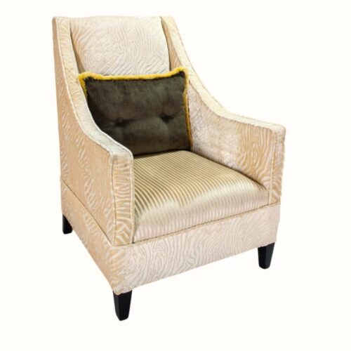 Luxury upholstered accent chair with contrast throw pillow