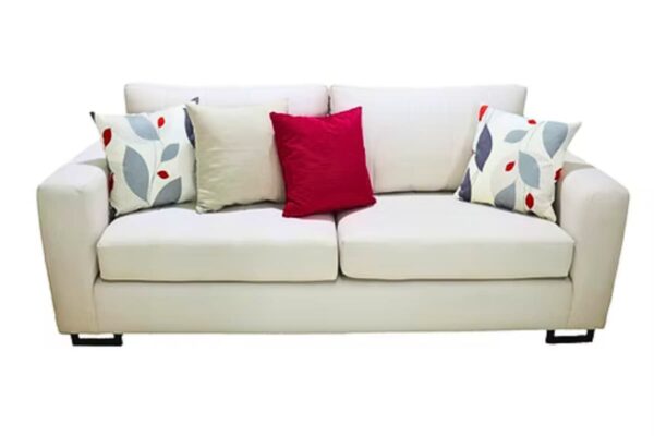Modern upholstered sofa set with colorful accent pillows