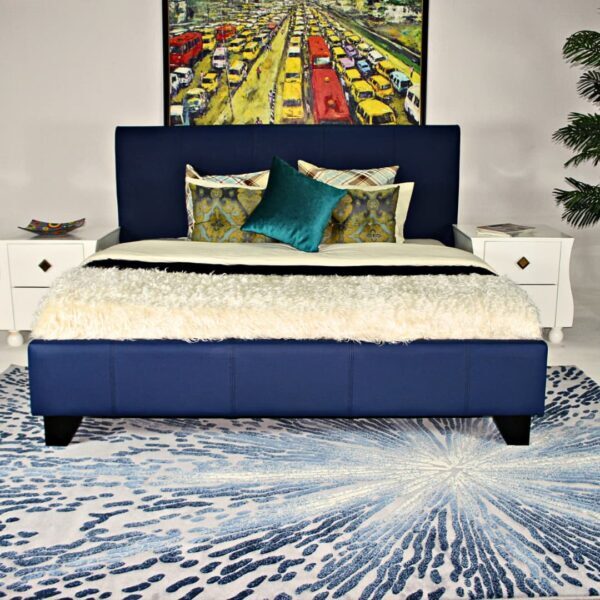 navy blue fully upholstered bed frame at CMC Interiors 