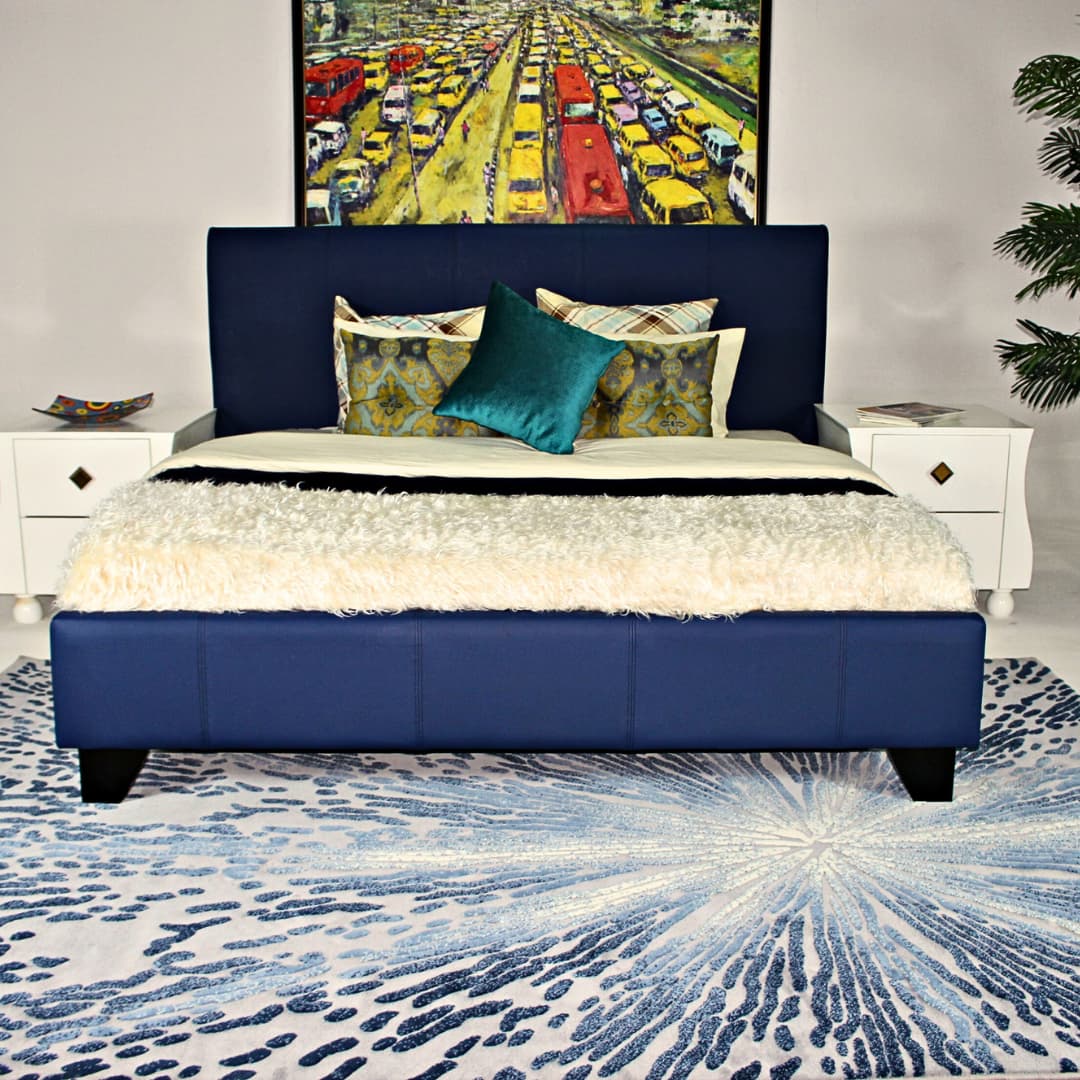 navy blue fully upholstered bed frame at CMC Interiors 