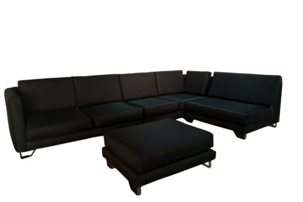 Black L-shaped sectional sofa with matching ottoman